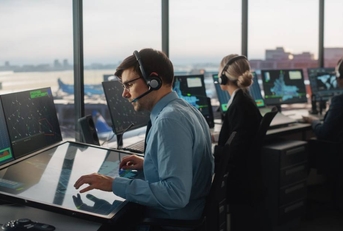 Air Traffic Control Team Working in a Modern Airport Tower