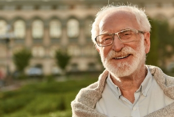 Portrait of a senior man smiling outdoors 