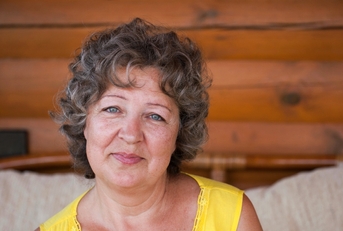 Woman white curly short white hair 