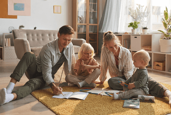 Young family playing on floor