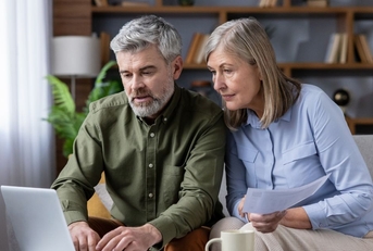 Couple reviewing retirement plan