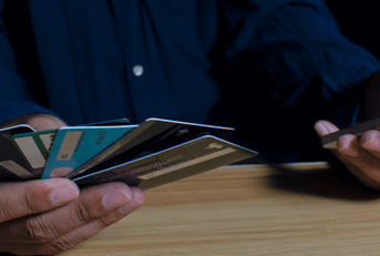 Man with multiple credit cards