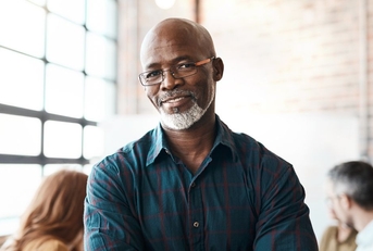Portrait of a mature businessman in office setting
