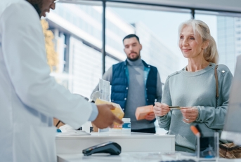 A woman at a pharmacy