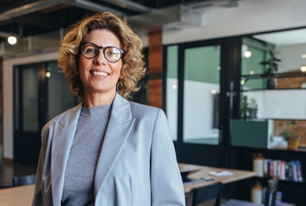 Smiling business woman in an office