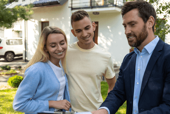 Real estate agent with couple 2