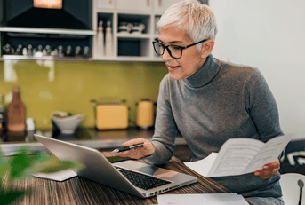Senior woman working at a computer