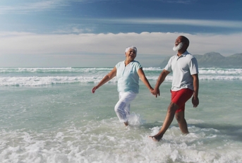 strolling retirees in beachwear