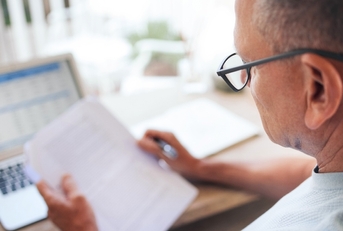 Man looking over finances
