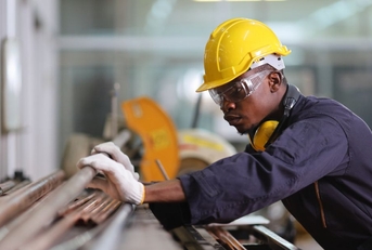 Mechanical engineer at work in factory
