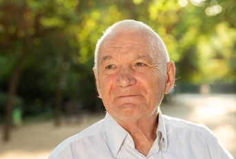 Portrait of cheerful senior man