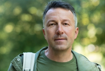 Portrait of a man in his 40s outdoors
