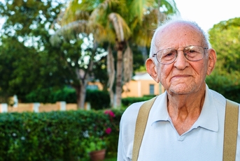Senior man around 80 years old in the garden