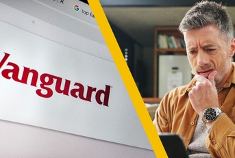 Vanguard webpage and confused man on laptop