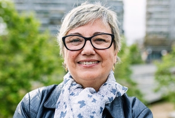 Portrait of a mature woman smiling outdoors