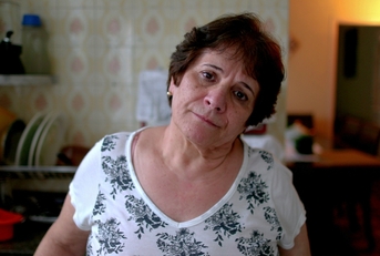 Woman in her 60s looking sad