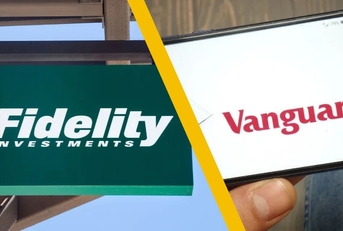 Fidelity Investments sign and Vanguard on mobile phone