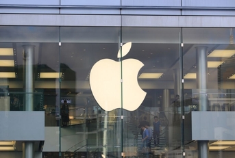 HONG KONG, APRIL 10: apple store logo with hong kong skyline in Central