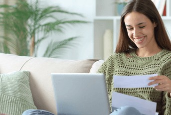 Woman doing online banking at home