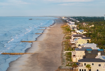 aerial view of shoreline and landscape of folly beach town near charleston