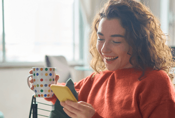 Woman checking banking account on phone