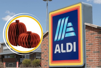 Aldi paper pumpkins in front of storefront