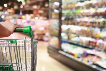 woman hand hold supermarket shopping cart