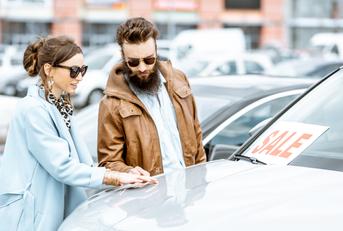 couple choosing luxury car