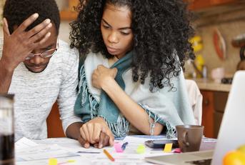 african-american couple with many debts