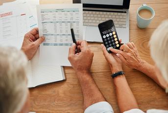 senior couple doing budget