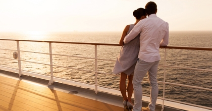 Couple at sunset on a ship