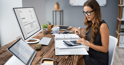 Woman doing side hustle taxes