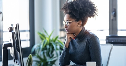 Woman looking at computer