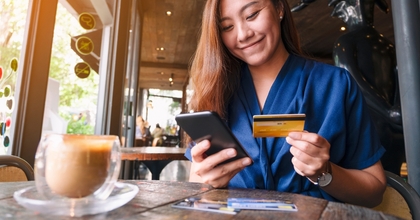 Woman buying something with credit card
