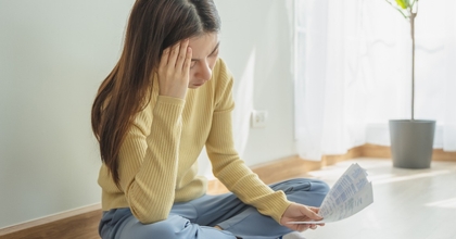 woman trying to find money to pay credit card debt