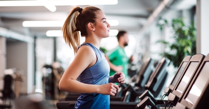 A woman working out on a treadmill