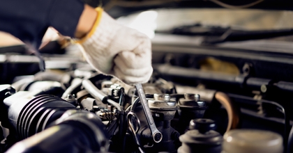 Mechanic working on car