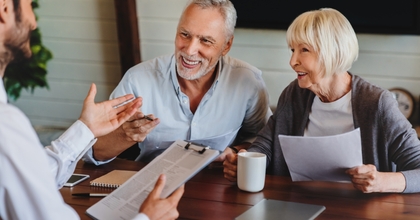 Senior couple opening a bank account