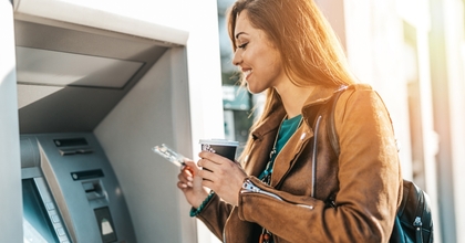 Woman using an ATM