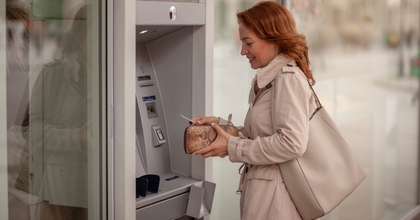 Woman using an ATM