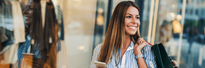 Smiling woman shopping