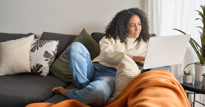 person on computer at home