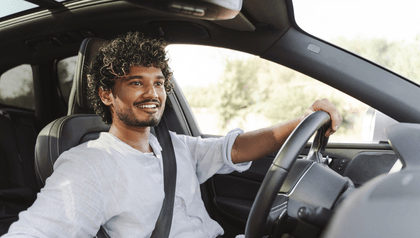 young driver at the wheel