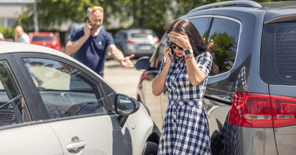 Woman making a call after an accident
