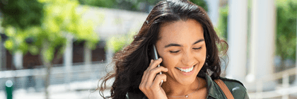 Smiling woman talking on phone