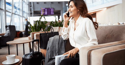 Business woman in an airport lounge