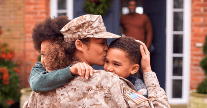 Female military mom with children