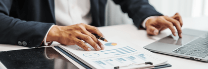 Man looking at investing trends