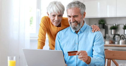 Couple using credit card online