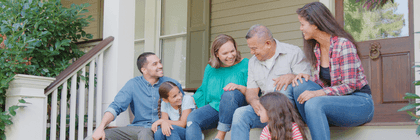 Smiling family on porch